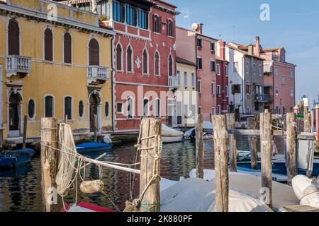 Chioggia glimpse from the arcades along the canals - Chioggia city, Venetian Lagoon, Verona province, Italy - suggestive image of Chioggia town Stock Photo