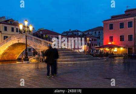 The Vigo bridge in historic centre of Chioggia city, Venetian lagoon, Venice province,northern italy - night photography - long exposure Stock Photo