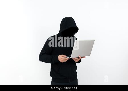 Man Standing With Laptop Presenting Cyber Security. Businessman Thinking Deeply For Information Technology Defence. Guy Brain Storming Brilliant Stock Photo
