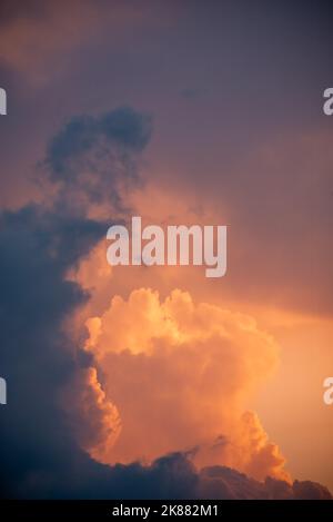 Intense glowing clouds at sunset with neagative space for cop.y. Stock Photo