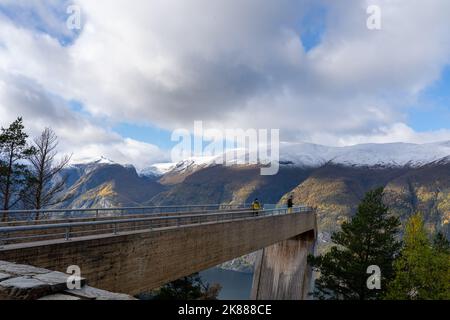 People on Stegastein viewpoint observation deck near Aurland in Norway. Stock Photo