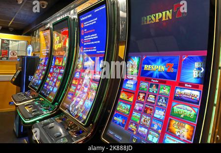 Tempting fruit machines for gamblers at Frankley Services M5 south, West Midlands, England, UK Stock Photo