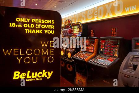 BeLucky Casino Slots cash prizes - We Welcome You - Only Persons 18yrs old & over - Thank You - High Street, Cheltenham, Gloucestershire, England, UK Stock Photo
