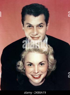 Tony Curtis & Janet Leigh  Married Actor & Actress   01 May 1954   **WARNING** This Photograph is for editorial use only and is the copyright of The Film Company and/or the Photographer assigned by the Film or Production Company and can only be reproduced by publications in conjunction with the promotion of the above Film. A Mandatory Credit To The Film Company is required. The Photographer should also be credited when known. No commercial use can be granted without written authority from the Film Company. Stock Photo