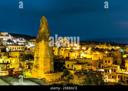 Night view of Goreme, Turkey. Goreme is known for its fairy chimneys, eroded rock formations, many of which were hollowed out in the Middle Ages to cr Stock Photo