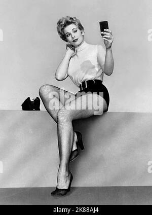 Kim Novak  Actress   01 May 1953   **WARNING** This Photograph is for editorial use only and is the copyright of The Film Company and/or the Photographer assigned by the Film or Production Company and can only be reproduced by publications in conjunction with the promotion of the above Film. A Mandatory Credit To The Film Company is required. The Photographer should also be credited when known. No commercial use can be granted without written authority from the Film Company. Stock Photo