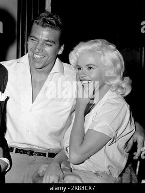 Mickey Hargitay & Jayne Mansfield  Actress And Husband   01 May 1957   **WARNING** This Photograph is for editorial use only and is the copyright of The Film Company and/or the Photographer assigned by the Film or Production Company and can only be reproduced by publications in conjunction with the promotion of the above Film. A Mandatory Credit To The Film Company is required. The Photographer should also be credited when known. No commercial use can be granted without written authority from the Film Company. Stock Photo