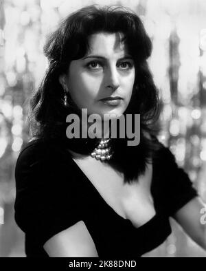 Anna Magnani  Actress   01 May 1955   **WARNING** This Photograph is for editorial use only and is the copyright of The Film Company and/or the Photographer assigned by the Film or Production Company and can only be reproduced by publications in conjunction with the promotion of the above Film. A Mandatory Credit To The Film Company is required. The Photographer should also be credited when known. No commercial use can be granted without written authority from the Film Company. Stock Photo