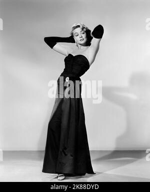Dorothy Malone  Actress   01 May 1956   **WARNING** This Photograph is for editorial use only and is the copyright of The Film Company and/or the Photographer assigned by the Film or Production Company and can only be reproduced by publications in conjunction with the promotion of the above Film. A Mandatory Credit To The Film Company is required. The Photographer should also be credited when known. No commercial use can be granted without written authority from the Film Company. Stock Photo