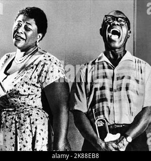 Ella Fitzgerald & Louis Armstrong  Singer   01 June 1954   **WARNING** This Photograph is for editorial use only and is the copyright of The  Film Company and/or the Photographer assigned by the  Film or Production Company and can only be reproduced by publications in conjunction with the promotion of the above  Film. A Mandatory Credit To The  Film Company is required. The Photographer should also be credited when known. No commercial use can be granted without written authority from the  Film Company. Stock Photo