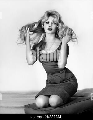 Brigitte Bardot  Actress   01 May 1959   **WARNING** This Photograph is for editorial use only and is the copyright of The Film Company and/or the Photographer assigned by the Film or Production Company and can only be reproduced by publications in conjunction with the promotion of the above Film. A Mandatory Credit To The Film Company is required. The Photographer should also be credited when known. No commercial use can be granted without written authority from the Film Company. Stock Photo