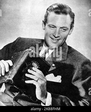 William Holden  Actor   01 May 1955   **WARNING** This Photograph is for editorial use only and is the copyright of The Film Company and/or the Photographer assigned by the Film or Production Company and can only be reproduced by publications in conjunction with the promotion of the above Film. A Mandatory Credit To The Film Company is required. The Photographer should also be credited when known. No commercial use can be granted without written authority from the Film Company. Stock Photo