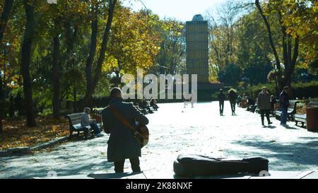 Kyiv, Ukraine - October 16, 2022: People are strolling through Taras Shevchenko park in Kyiv, Ukraine Stock Photo