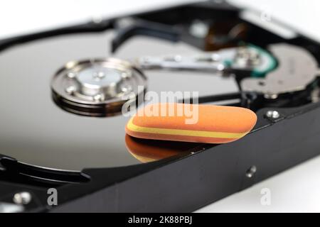 Eraser on a computer hard drive Stock Photo