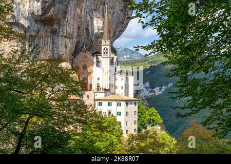 View from the mountain hiking trail of the Santuario de la Madonna della Corona, a historic mountainside church built in 1625 in Spiazzi, Italy Stock Photo