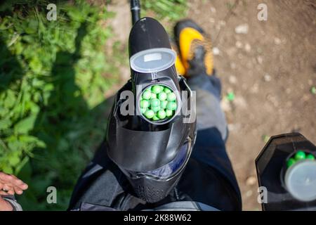 Balls with paint in jar. Sports equipment. Preparation for tactical shooting at target. Stock Photo