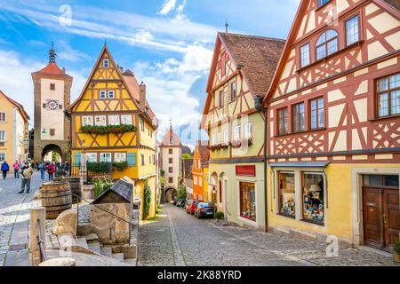 The picturesque Plönlein, or Little Square, a famous split in the road in the Bavarian village of Rothenburg ob der Tauber, Germany. Stock Photo