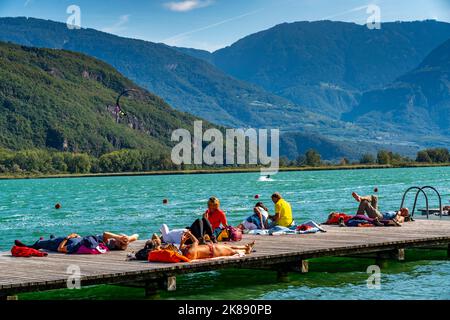 Gretl am See lido on Lake Kaltern, near the village of Kaltern, in the Adige Valley in South Tyrol, one of the two warmest lakes in the Alps, bathing Stock Photo