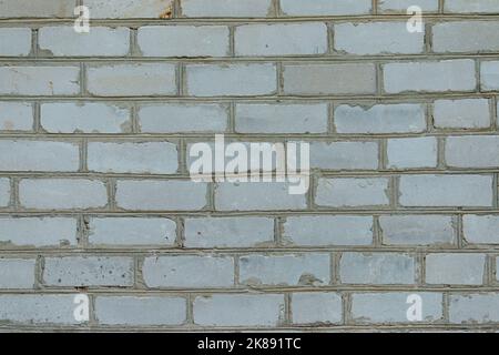White brick wall made from used material. Abstract texture background image Stock Photo