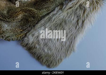 Fox fur textures. Fox shaggy fur texture. Abstract fabric. Fluffy rusty texture. Smooth surface, rough skin background. Stock Photo