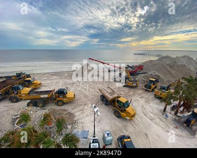Fort Myers Beach, FL, USA--10/19/22--Crews work to cleanup sand that was scattered throughout Fort Myers Beach during Hurricane Ian and use the sand to build back the seawall.    Jocelyn Augustino/FEMA Stock Photo