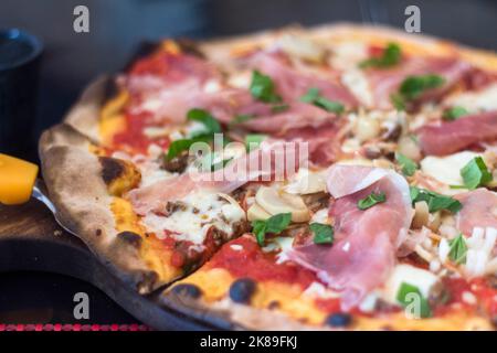 Pizza served at an Italian restaurant in Tacloban City, Philippines Stock Photo