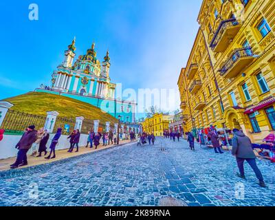 KYIV, UKRAINE - JANUARY 2, 2022: Enjoy pleasant walk along Andrew's Descent in surrounding of historical landmarks and traditional tourist market, on Stock Photo
