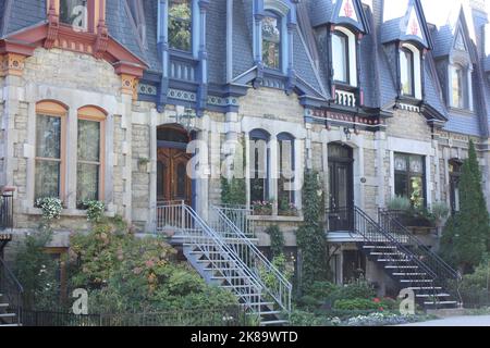 Houses and the steps leading to their front doors on Laval Street in Montreal, Quebec, Canada Stock Photo
