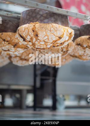 panettone cooking secrets concept hanging up down in the kitchen Stock Photo
