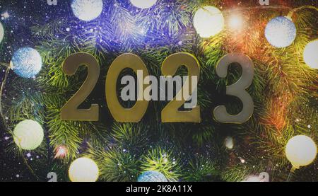 Christmas tree branches with snow and paper card note. Flat lay. Nature New Year concept. Stock Photo