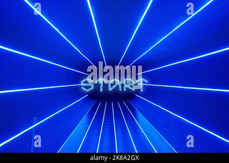 Blue background with laser beams and text Start. Background for splash screen for gaming, cybersport and metaverse. Stock Photo