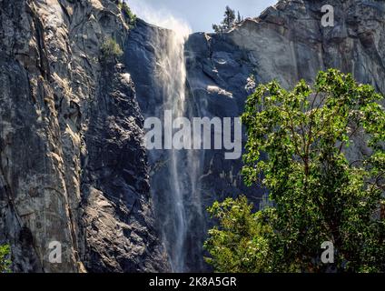 Bridalveil Fall, 188 metres in height, is one of the most prominent waterfalls in Yosemite National Park, California. Stock Photo