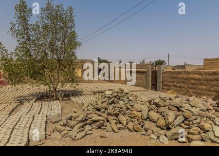 Stones and sun dried bricks in Abri, Sudan Stock Photo