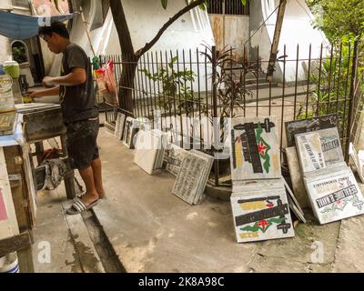 Manila, Philippines. 21st Oct, 2022. Different kinds of gravestone leaning at a steel railings of a graveyard ahead of All Saints Day. Filipinos start to flock to Manila North Cemetery ahead of the All Saints Day celebration. All Saints' Day is a Christian solemnity, or dignified remembrance, that celebrates the honor of all church saints, whether known or unknown many use the holiday to remember deceased loved ones. Flower vendors showcase their merchandise, as craftsmen carve gravestone upon demand from clients. Credit: SOPA Images Limited/Alamy Live News Stock Photo