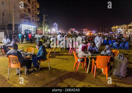 OMDURMAN, SUDAN - MARCH 6, 2019: People sit at the open air restaurant tables in Omdurman, Sudan Stock Photo