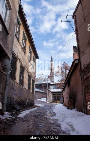 Winter landscape on the streets of Erzurum. Kurşunlu Mosque in the Background. Stock Photo