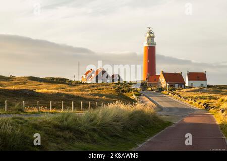 Lighthouse in the dune area on the Dutch Wadden Island of Texel. Stock Photo