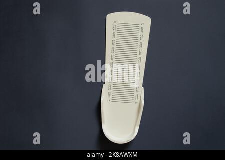 stopwatch for measuring leg length on an isolated background, plastic leg length meter Stock Photo