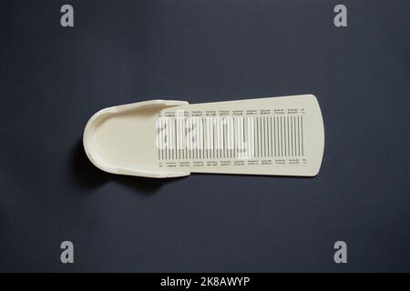 stopwatch for measuring leg length on an isolated background, plastic leg length meter Stock Photo