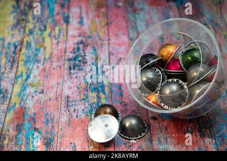 Nespresso Coffee Pods On Colorful Wooden Background Stock Photo