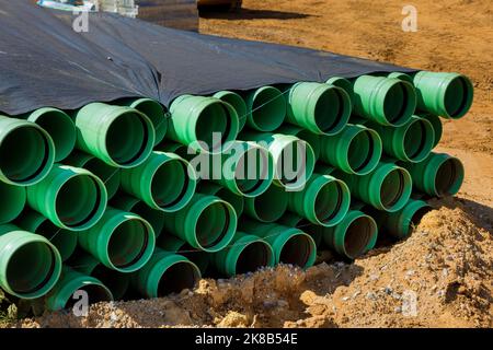 In construction sites PVC green plastic pipes are used as sewerage material a work area Stock Photo