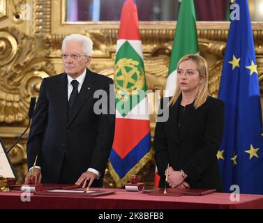 Rome, Italy. 22nd Oct, 2022. Italian President Sergio Mattarella (L) and newly appointed Prime Minister Giorgia Meloni attend the swearing-in ceremony at the presidential palace in Rome, Italy, Oct. 22, 2022. TO GO WITH 'Italy's new PM, gov't sworn in' Credit: Jin Mamengni/Xinhua/Alamy Live News Stock Photo