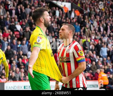 Grant Hanley #5 of Norwich City and Billy Sharp #10 of Sheffield United react during the Sky Bet Championship match Sheffield United vs Norwich City at Bramall Lane, Sheffield, United Kingdom, 22nd October 2022  (Photo by Steve Flynn/News Images) Stock Photo