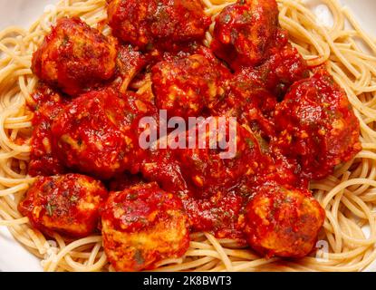 Turkey meatballs with garlic and basil tomato sauce and wholewheat pasta Stock Photo