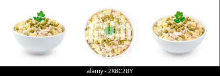 A set of traditional olivier salad with vegetables and fresh herbs in different angles Stock Photo