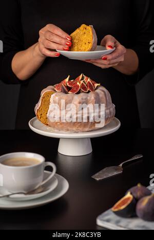 Food photography of cupcake, cake with figs, icing, cappuccino, coffee, pastry, dessert, woman Stock Photo
