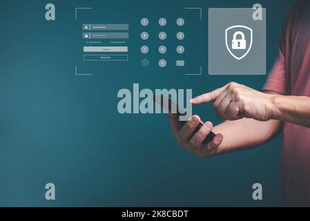 Man hands using smartphone log into website application with username, password and footprint for cyberspace security protection, copy space. Stock Photo