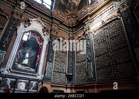 The ossuary inside the Sanctuary of San Bernardino alle Ossa, small side chapel beside of the Basilica of Saint Stephen, in Milan city center, Italy Stock Photo