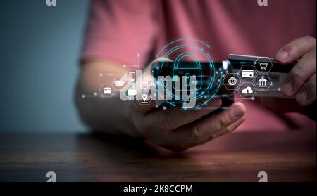 Cybersecurity and privacy concepts to protect data. Lock icon and internet network security technology. Businessman protecting personal data on smart Stock Photo