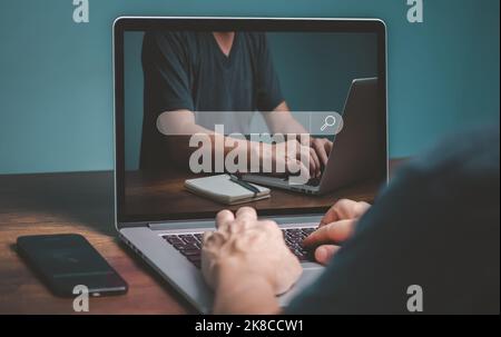 le Job search concept, man using laptop computer, browsing and searching job openings, work opportunities on online, using job search bar computer, fi Stock Photo